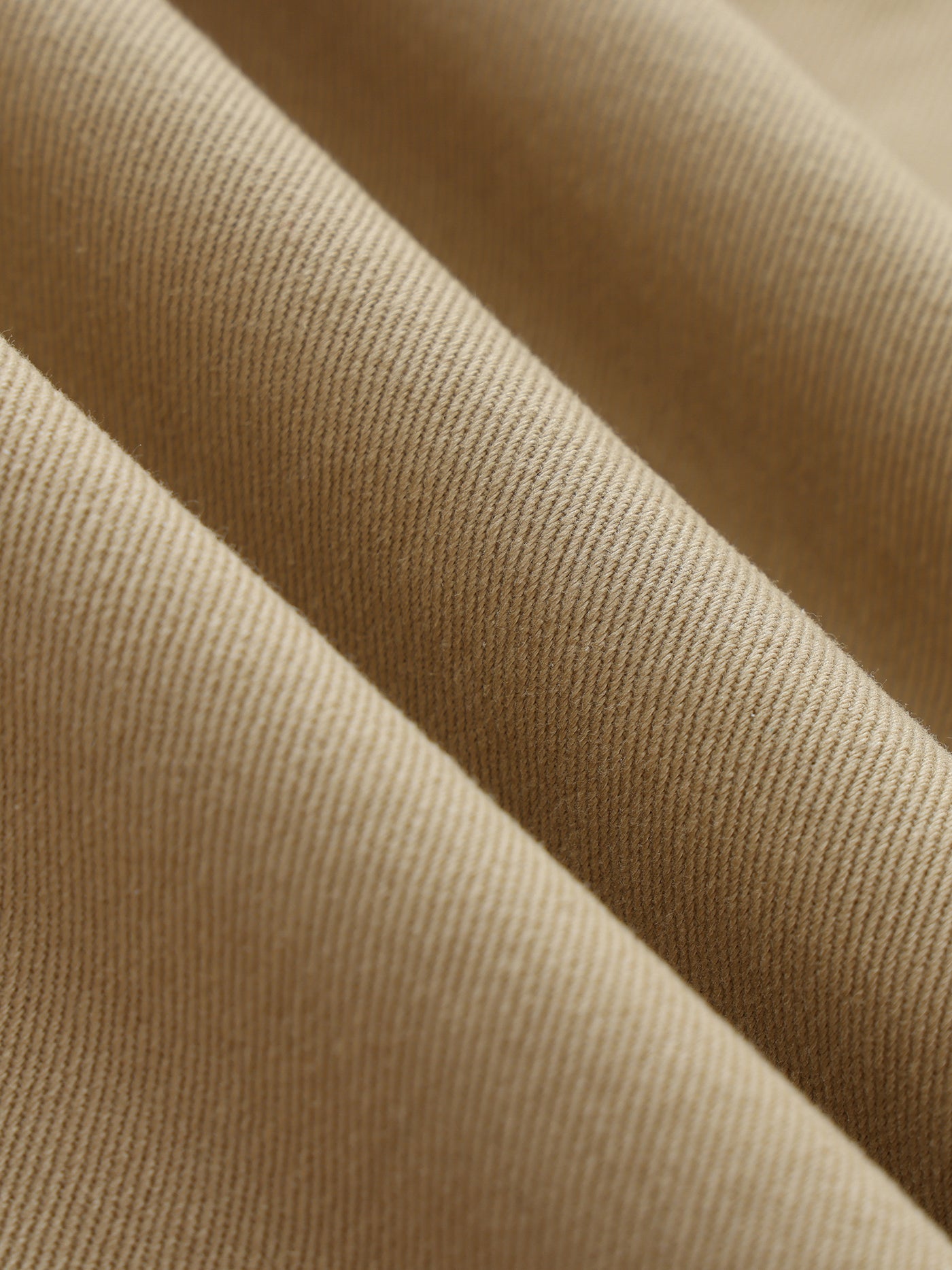 Twisted-Seam Belted Curved-Blade Pants